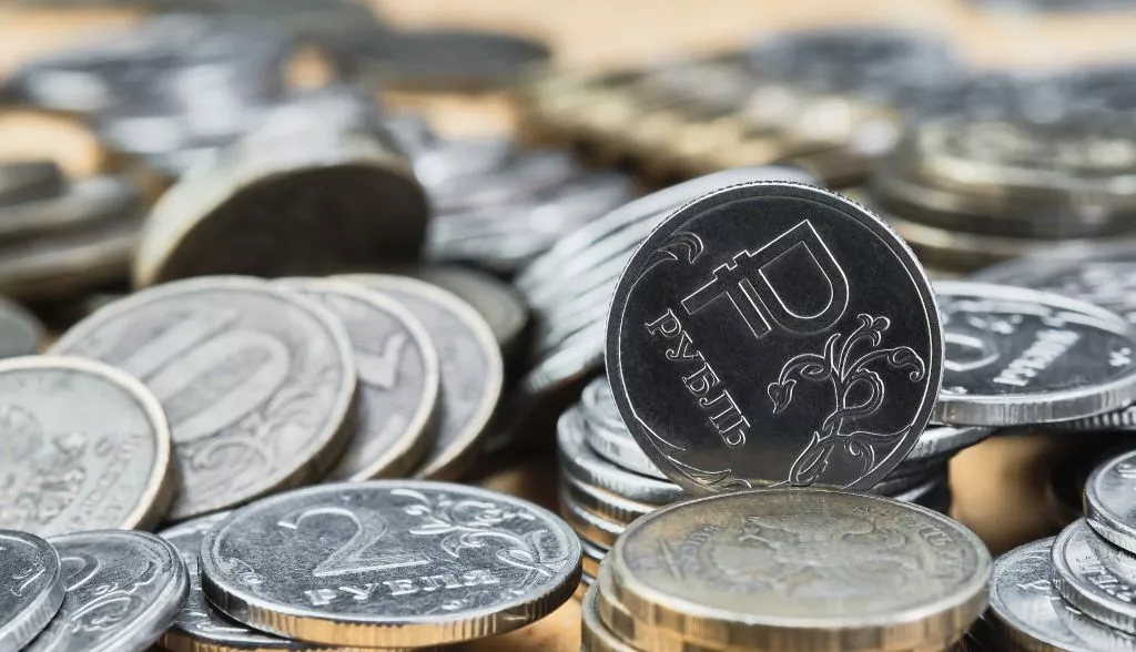 background-blurry-out-of-focus-bokeh-and-pasteurization-coins-of-the-russian-ruble-on-the-table-the-change-in-the-exchange-rate-of-the-ruble-idea-for-economic-news-banner (1).jpg